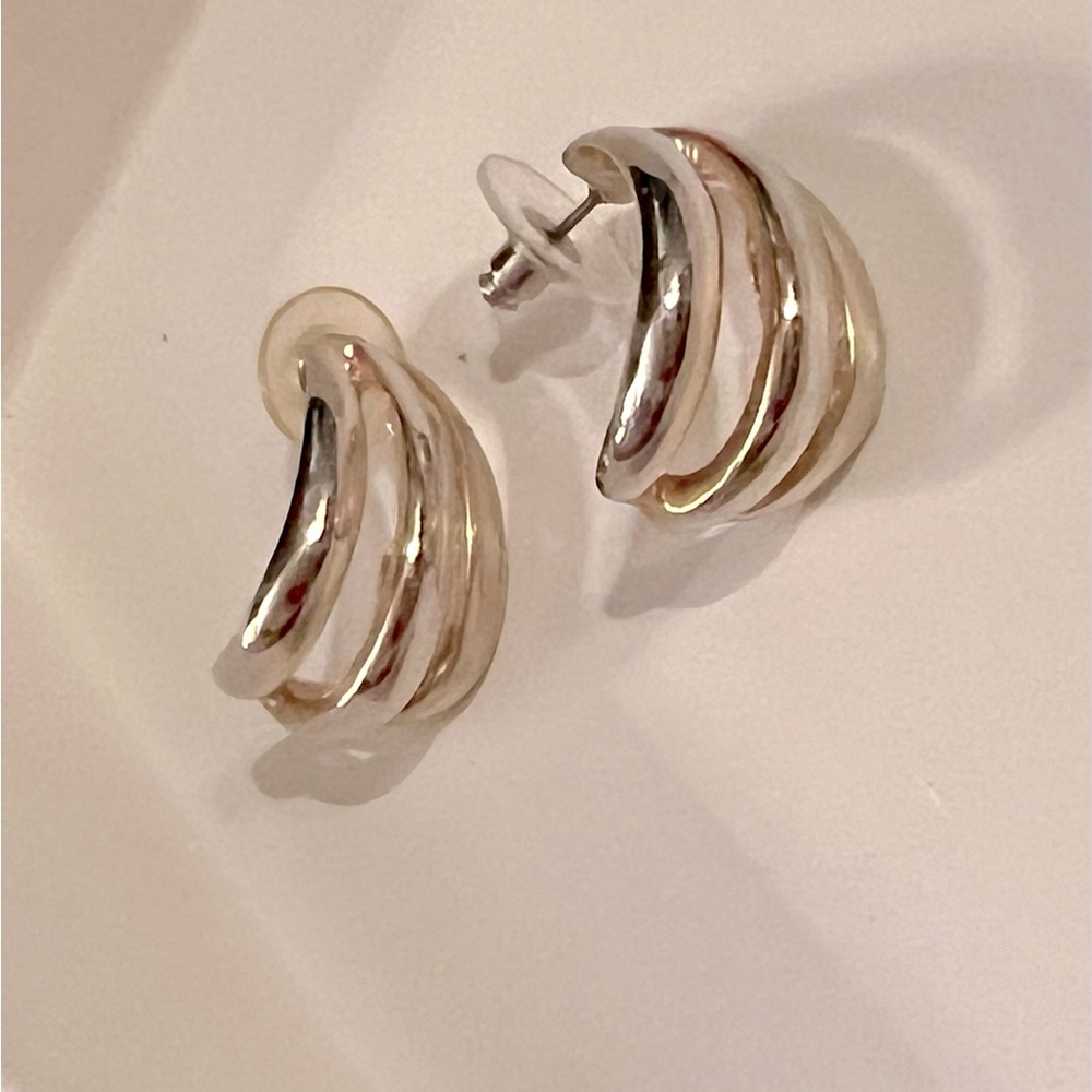 Silver and gold tone earrings